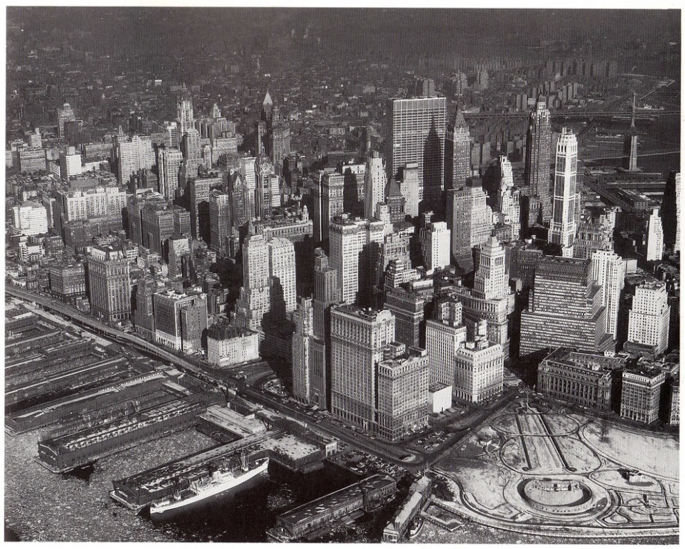 Aerial view of Lower Manhattan looking northeast from Hudson River. February 1961.