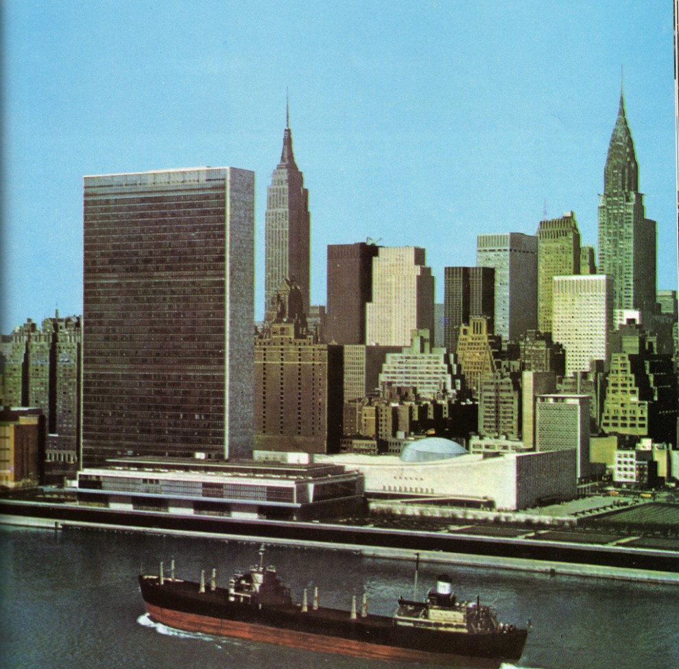 Aerial view of new face of Midtown Manhattan skyline looking southwest from East River showing United Nations. May 1961