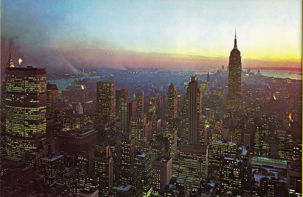 Night view of Midtown Manhattan looking southeast from RCA Building with Pan Am Building on left. Christmas 1963.
