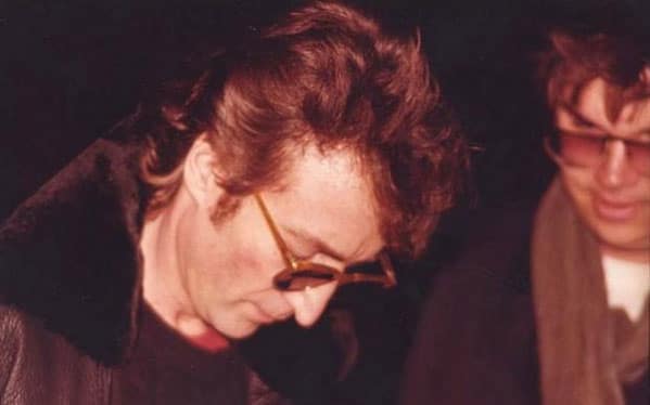 John Lennon signs an autograph for Mark Chapman, hours before his death.