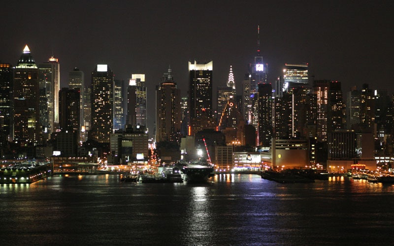 Night view of an illuminated Manhattan skyline from 6th August 2005.