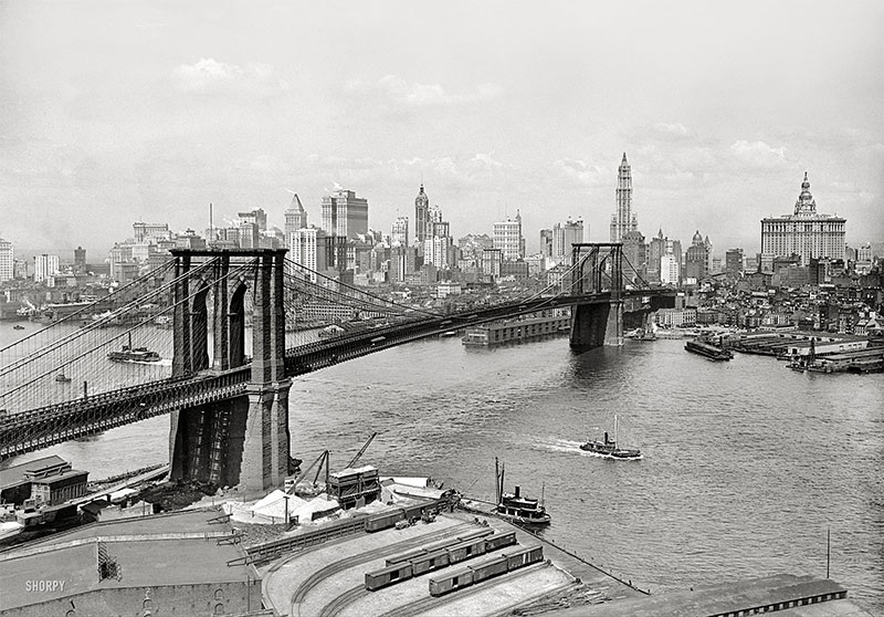 Brooklyn Bridge, East River and Lower Manhattan skyline (c 1915)