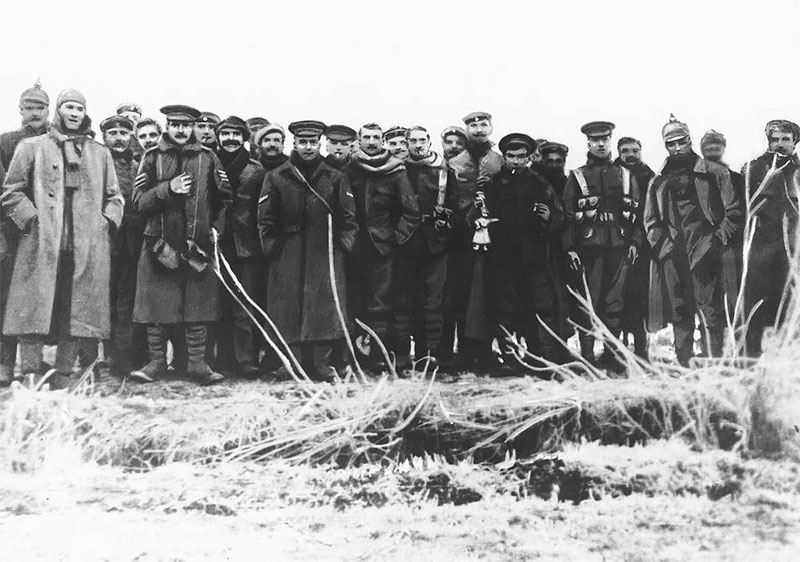 Soldiers from both sides taking a picture together during the impromptu Christmas truce of WW1 on Dec. 24, 1914.