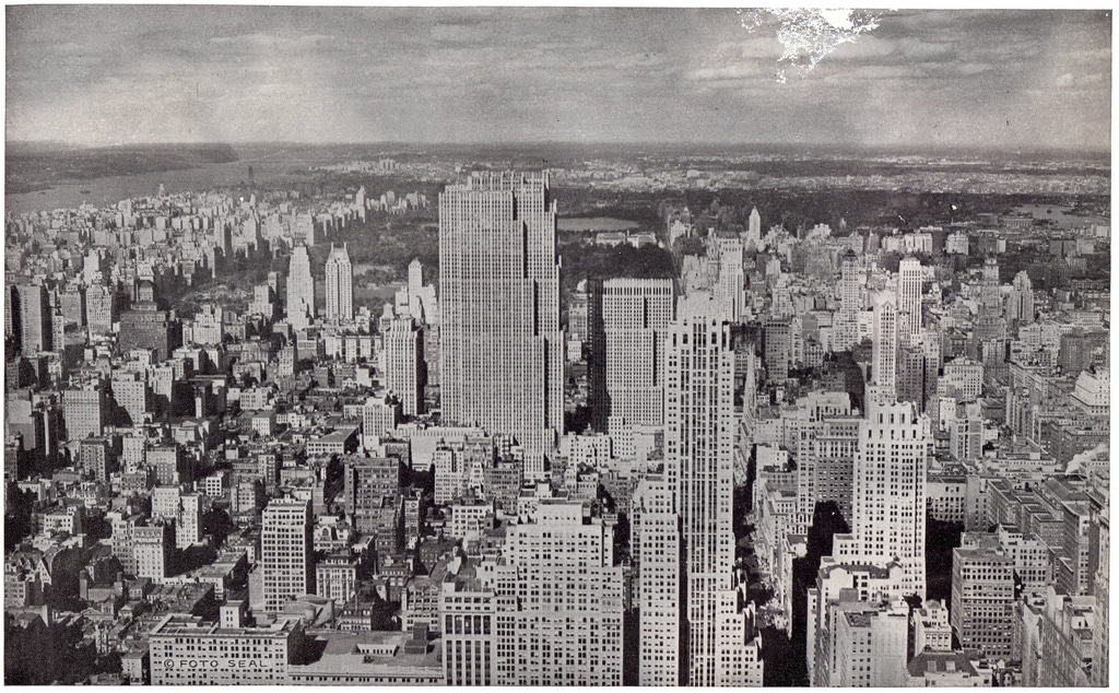 Midtown Manhattan looking north from Empire State Building in July 1935 with the Rockefeller Center's newly completed 41-story International Building.