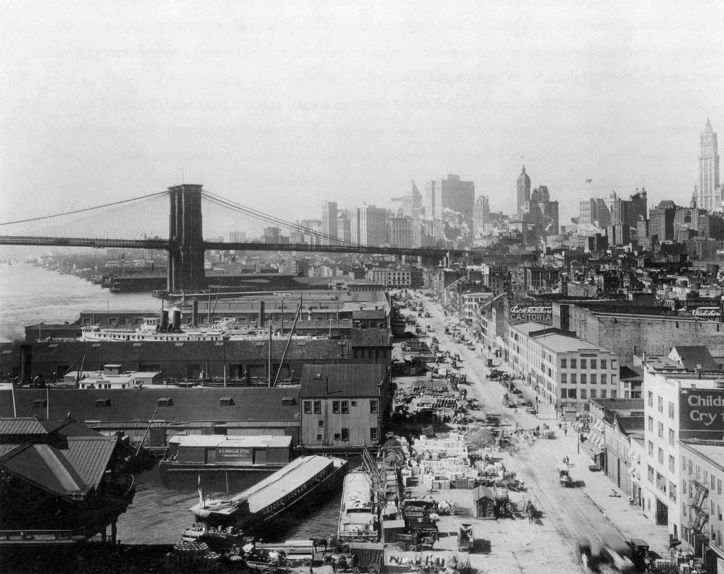 View of the Lower Manhattan skyline looking South West across the Brooklyn Bridge (1924).